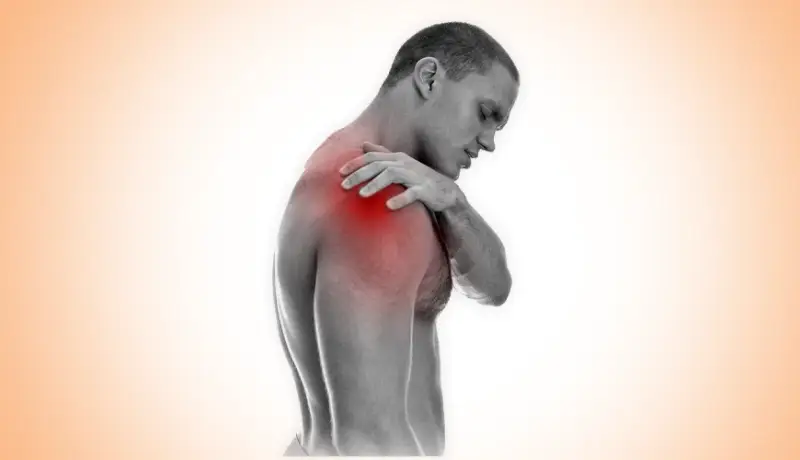 Physiotherapist assessing shoulder movement for shoulder pain treatment at Physiatrics Physiotherapy Clinic in Islamabad